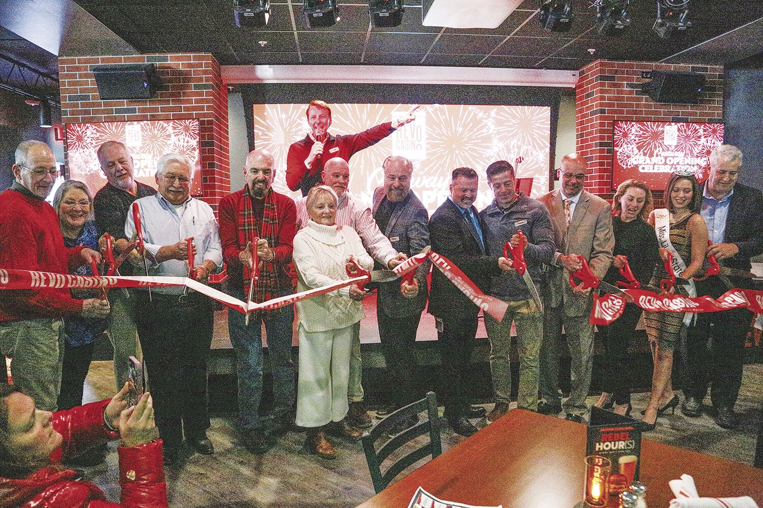 Ribbon-cutting for Revo, with all the bells and whistles